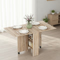 Table de cuisine pliante mobile avec roulettes, finition naturelle et dimensions 140 x 75 x 74 cm pour petits espaces