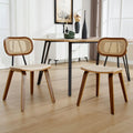 Paire de chaises vintage en rotin et bois avec finition beige, mobilier chaleureux pour salle a manger